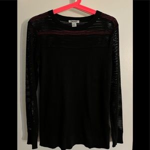 Light DKNY sweater with graphic cut out elements